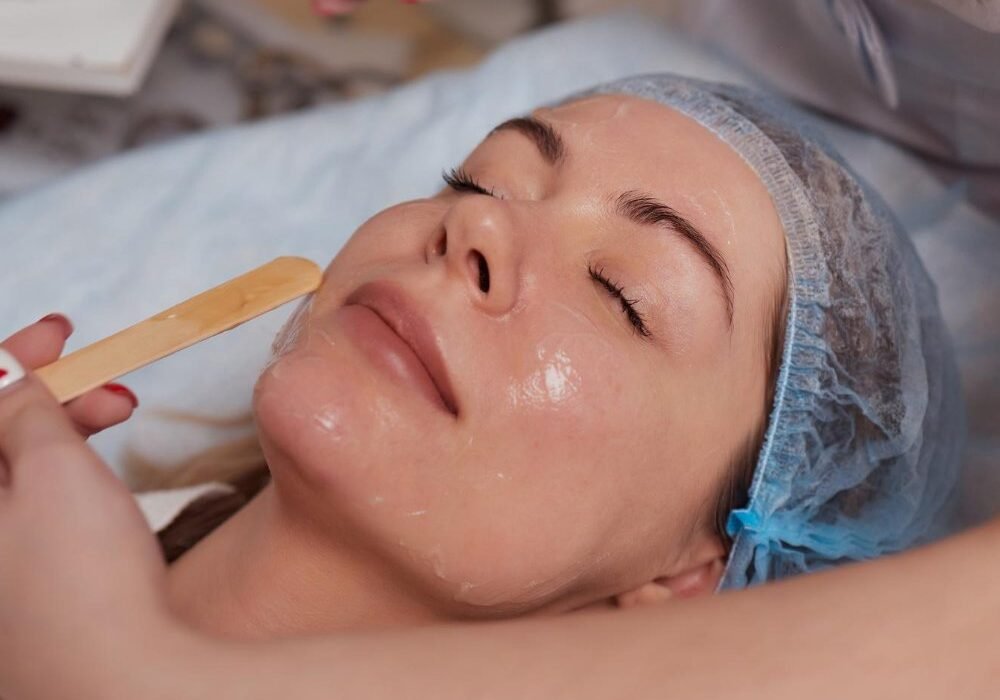 Esthetician applying ELAB FRANCE Post Peeling Cream to a client after a chemical peel